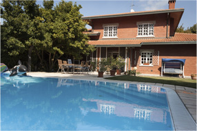 house with pool in backyard